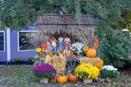 Autumn garden with pumpkins and colorful leaves