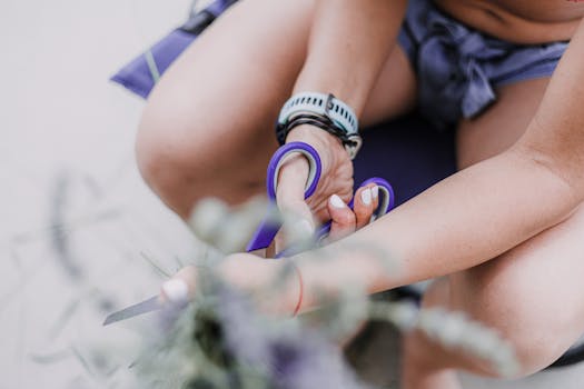 Cutting garden fabric around a plant